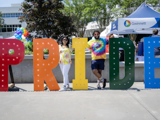 Large Pride letters in rainbow colors